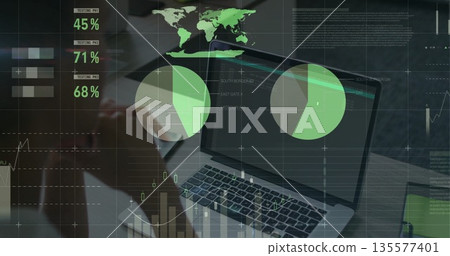 Laptop displaying green data visuals at office desk, with notebook pen coffee cup smartphone Laptop displaying green data visuals at office desk, with notebook pen coffee cup smartphone 135577401