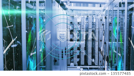 Illuminating central server racks showing shield icon with envelope in data center corridor 135577485