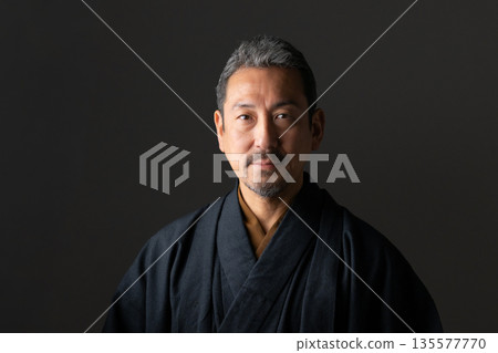 A man wearing a kimono 135577770