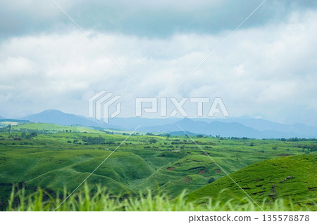 Aso mountain range and blue sky 135578878