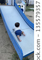 Infants playing in the park 135579357
