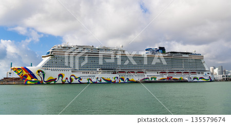 Miami, Florida, USA - November 03, 2024: Norwegian Encore cruise ship voyage. Cruise in summer vacation. Norwegian cruise line. Cruise ship tour and travel at sea. Ship leaving Miami port Miami, Florida, USA - November 03, 2024: Norwegian Encore cruise ship voyage. Cruise in summer vacation. Norwegian cruise line. Cruise ship tour and travel at sea. Ship leaving Miami port 135579674