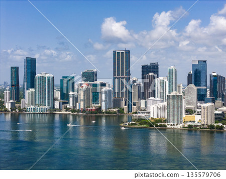 Aerial view of Brickell skyscrapers. Modern cityscape of downtown Miami. Panoramic Miami skyline above the coastline. 135579706