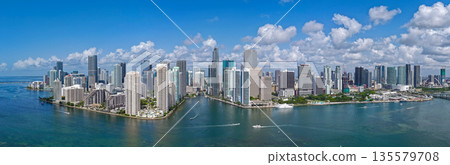 Panorama of Brickell in Miami. Panorama of Miami skyline on a sunny day. Panorama view of Miami Beach and Brickell. Brickell famous panorama. Miami downtown landscape. Panorama of Brickell in Miami. Panorama of Miami skyline on a sunny day. Panorama view of Miami Beach and Brickell. Brickell famous panorama. Miami downtown landscape. 135579708