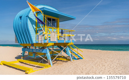 Miami Beach pier. Iconic lifeguard tower on Miami Beach. Scenic view of Miami Beach coastline. Famous South Beach lifeguard. Tropical paradise in Miami. Art Deco lifeguard on Miamis shoreline. 135579710