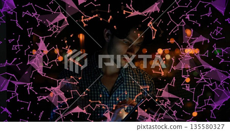 Interacting man in checkered shirt tapping smartphone on rooftop, with digital network graphics Interacting man in checkered shirt tapping smartphone on rooftop, with digital network graphics 135580327