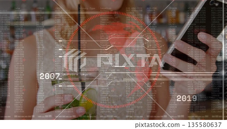 Holding smartphone and red cocktail with straw, woman viewing data overlay at bar with bottles Holding smartphone and red cocktail with straw, woman viewing data overlay at bar with bottles 135580637