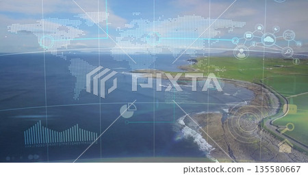 Displaying green headland extending into calm sea at shoreline, with digital map and chart overlays 135580667