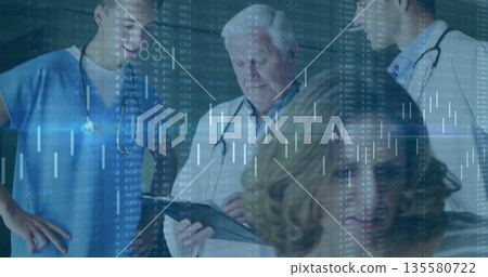 Senior male doctor in white coat consulting patient in hospital room, with tablet, data overlays 135580722