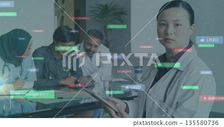 Holding tablet white coat doctor with stethoscope viewing overlays at hospital room, copy space 135580736