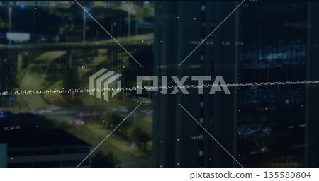Displaying dotted line grid overlay in office at night, with highway lights and reflective facade 135580804