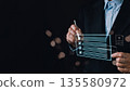 A businessman uses a stylus on a digital checklist interface with glowing blue lines, symbolizing technology driven task management,efficiency,organization,and modern productivity solutions. 135580972