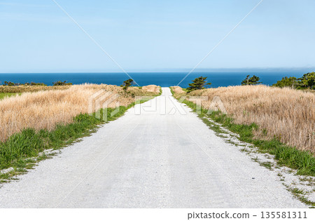 Cape Soya, Wakkanai, Hokkaido - A popular tourist attraction: Cape Soya's "White Road" and blue sea Cape Soya, Wakkanai, Hokkaido - A popular tourist attraction: Cape Soya's "White Road" and blue sea 135581311