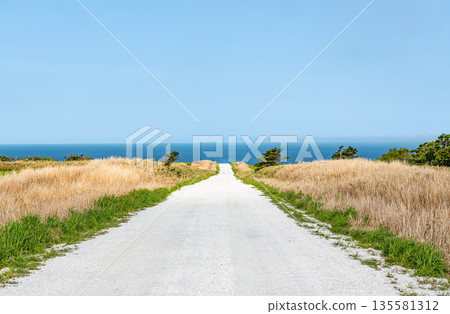 Cape Soya, Wakkanai, Hokkaido - A popular tourist attraction: Cape Soya's "White Road" and blue sea Cape Soya, Wakkanai, Hokkaido - A popular tourist attraction: Cape Soya's "White Road" and blue sea 135581312