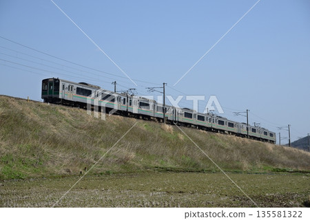 701 series train running on the Tohoku Main Line 701 series train running on the Tohoku Main Line 135581322