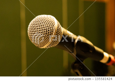 Close-Up of Microphone on Stand in Music Rehearsal Room Close-Up of Microphone on Stand in Music Rehearsal Room 135581424