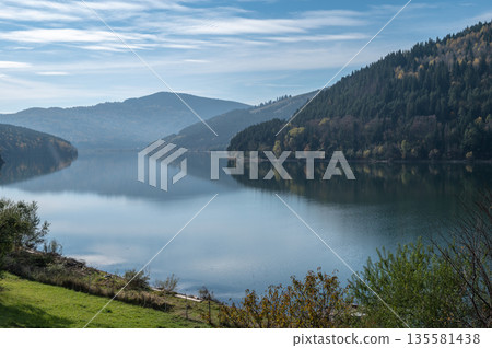 Peaceful Autumn Landscape Of Lake Izvorul Muntelui In Romanian Mountains Peaceful Autumn Landscape Of Lake Izvorul Muntelui In Romanian Mountains 135581438