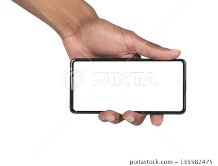 Smartphone held horizontally in hand for video or game display. Black skin male showing digital Smartphone held horizontally in hand for video or game display. Black skin male showing digital 135582475