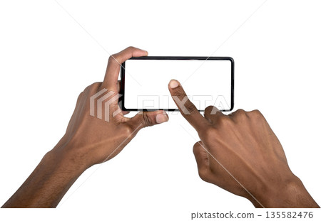 Smartphone held horizontally with finger tapping center of screen. Black skin male interacting with Smartphone held horizontally with finger tapping center of screen. Black skin male interacting with 135582476
