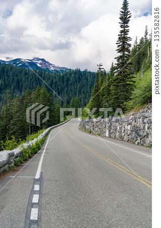 Landscape of mountain and road. Travel destination. Landscape route to North Cascades National Park. Scenic nature. North Cascades nation park. Road with mountain landscape. Traveling by car Landscape of mountain and road. Travel destination. Landscape route to North Cascades National Park. Scenic nature. North Cascades nation park. Road with mountain landscape. Traveling by car 135582816