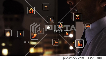 Viewing Asian businessman analyzing digital sustainability metrics at office window, copy space 135583003