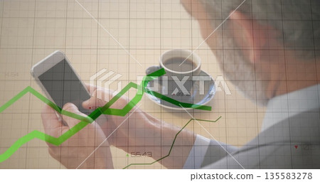 Tapping businessman analyzing markets on smartphone at desk, with coffee, stock graphs, copy space Tapping businessman analyzing markets on smartphone at desk, with coffee, stock graphs, copy space 135583278