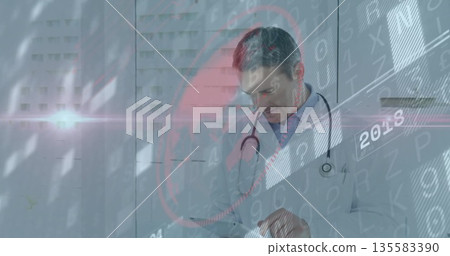 Labcoat-wearing doctor viewing data on tablet in medical corridor, with stethoscope, pen copy space Labcoat-wearing doctor viewing data on tablet in medical corridor, with stethoscope, pen copy space 135583390