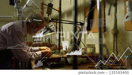 Senior watchmaker repairing mechanical parts on workbench in workshop, with desk lamp, copy space Senior watchmaker repairing mechanical parts on workbench in workshop, with desk lamp, copy space 135583400