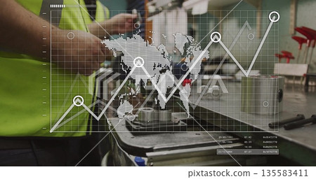 Technician in safety vest tightening metal cylinders on workbench, with data overlay copy space Technician in safety vest tightening metal cylinders on workbench, with data overlay copy space 135583411