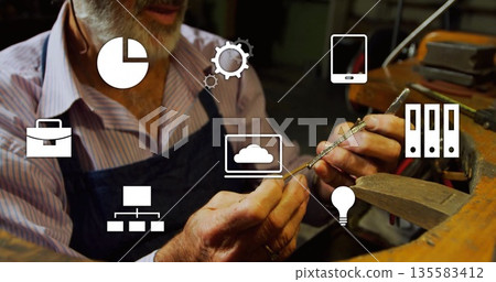 Holding precision pliers, craftsman wearing apron shaping metal ring in workshop, with icons Holding precision pliers, craftsman wearing apron shaping metal ring in workshop, with icons 135583412