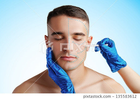 Male model receiving facial treatment in a clinical setting during daytime Male model receiving facial treatment in a clinical setting during daytime 135583612