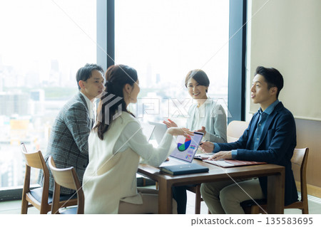 Businessmen having a meeting Businessmen having a meeting 135583695