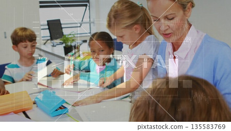Leaning teacher guiding group of elementary students at classroom table with worksheets, copy space Leaning teacher guiding group of elementary students at classroom table with worksheets, copy space 135583769