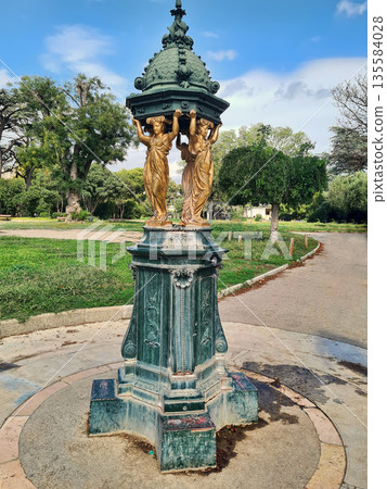 Marseille, France. Palace Longchamp palace in Marseille. The surrounding park (the Parc Longchamp) is listed by the French Ministry of Culture as one of the Notable Gardens of France. 135584028