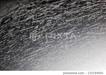 Surface of icy crystals seen closely, Detailed view of frozen surface with icy formations Surface of icy crystals seen closely, Detailed view of frozen surface with icy formations 135584091