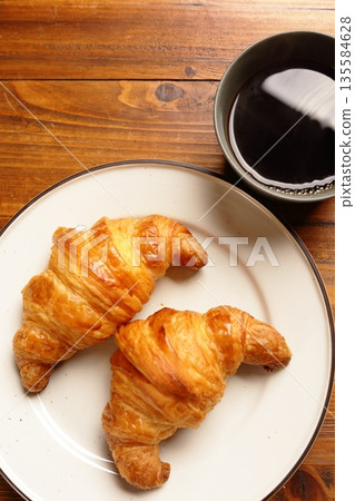 Croissants and coffee 135584628