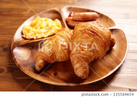 Croissants on a plate 135584654