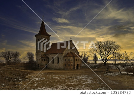 Beautiful old church of St. Linhart. Catholic temple village of Musov Pasohlavky, Czech Republic. Photo of landscape with sunset on a dam New Mills Nove Mlyny Beautiful old church of St. Linhart. Catholic temple village of Musov Pasohlavky, Czech Republic. Photo of landscape with sunset on a dam New Mills Nove Mlyny 135584783