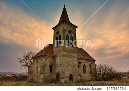 Beautiful old church of St. Linhart. Catholic temple village of Musov Pasohlavky, Czech Republic. Photo of landscape with sunset on a dam New Mills Nove Mlyny Beautiful old church of St. Linhart. Catholic temple village of Musov Pasohlavky, Czech Republic. Photo of landscape with sunset on a dam New Mills Nove Mlyny 135584784