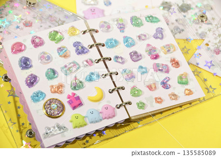 A sticker book filled with lots of stickers 135585089