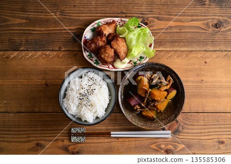 Deep fried chicken with simmered pumpkin and sweet potato Deep fried chicken with simmered pumpkin and sweet potato 135585306