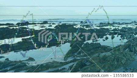 Displaying shoreline with jagged rocks and tidal pools at low tide, showing candlestick overlays 135586533