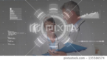 Doctors examining digital interface in hospital corridor using smartphone, clipboard, stethoscopes Doctors examining digital interface in hospital corridor using smartphone, clipboard, stethoscopes 135586574