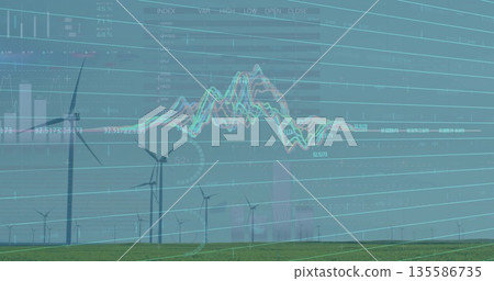 Spinning wind turbines on grassy plain under overcast sky, with digital stock market chart overlay 135586735