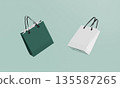 White and Green Retail Paper Shopping Bags Mock up. 3D Rendering. 135587265