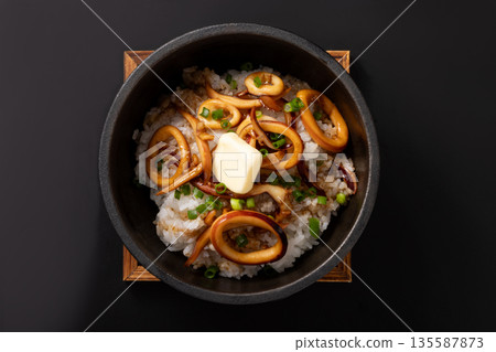 Stone-grilled squid with butter and rice Stone-grilled squid with butter and rice 135587873