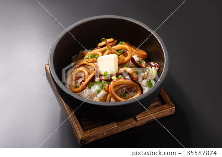 Stone-grilled squid with butter and rice 135587874