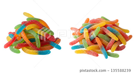 Vibrant, translucent piles of assorted gummy worm candies on a transparent background. Perfect for candy stores, party themes, and sweet graphics 135588239