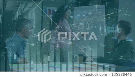 Presenting woman in business attire drawing on whiteboard in meeting room, with fiscal charts Presenting woman in business attire drawing on whiteboard in meeting room, with fiscal charts 135588446