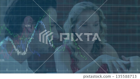 Father and daughter studying financial data in modern office, with chart overlay on computer screen 135588713